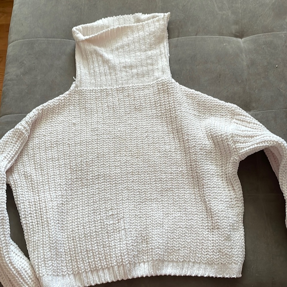 White turtleneck sweater